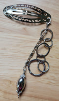 Handmade silver filigree hair clip with cascading chain rings and silver locket bead pendant
